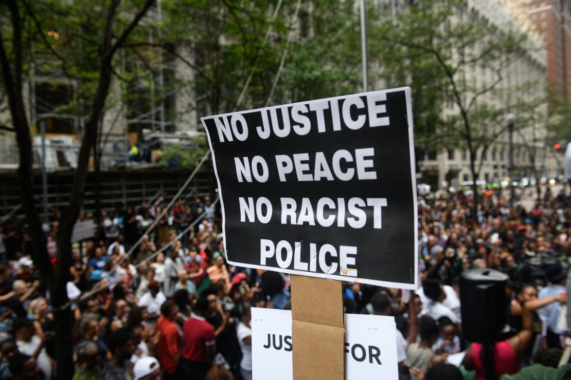 Protesters gather Thursday, June 21, 2018, outside the Allegheny County Courthouse in Pittsburgh to call for justice in the shooting death of Antwon Rose.