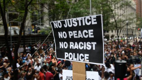 Protesters gather Thursday, June 21, 2018, outside the Allegheny County Courthouse in Pittsburgh to call for justice in the shooting death of Antwon Rose.