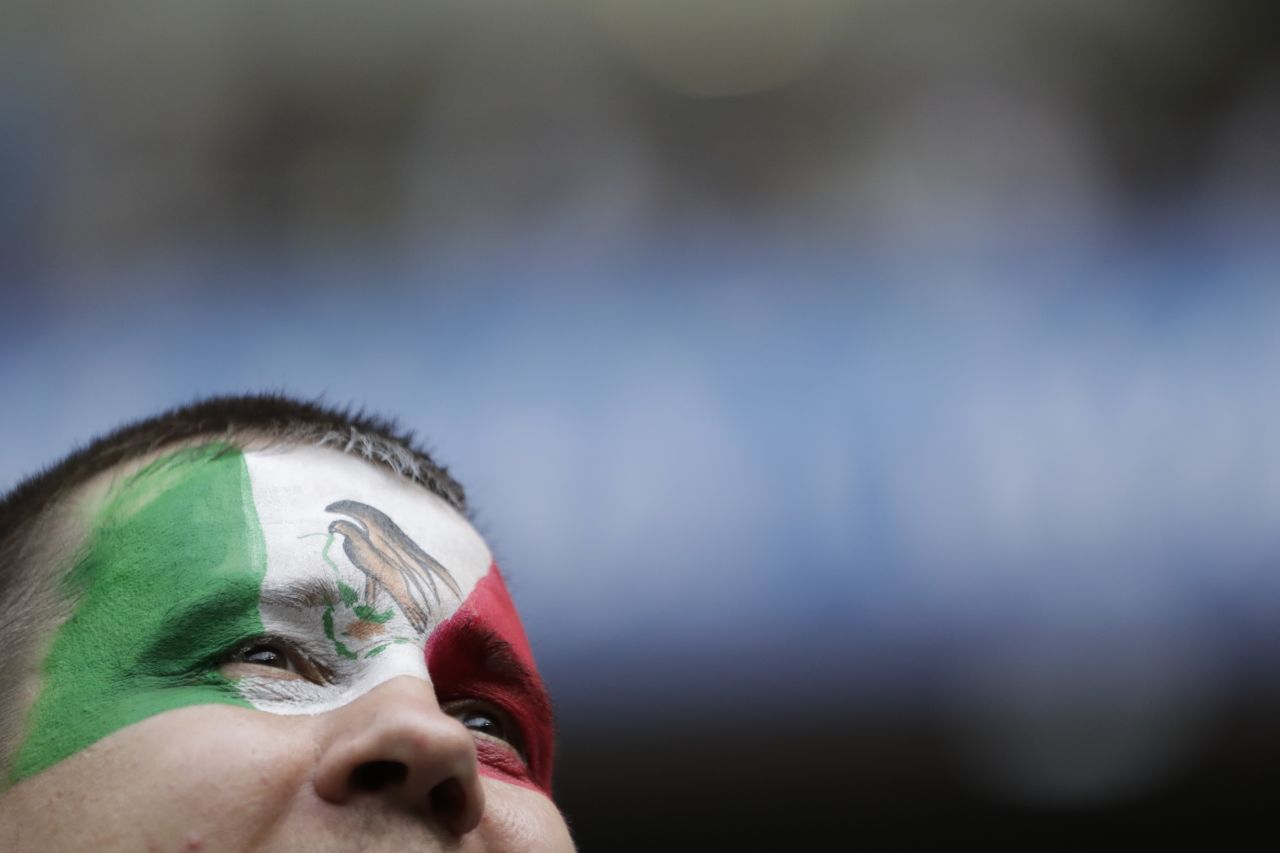 A Mexico fan waits for the start of the match against South Korea.
