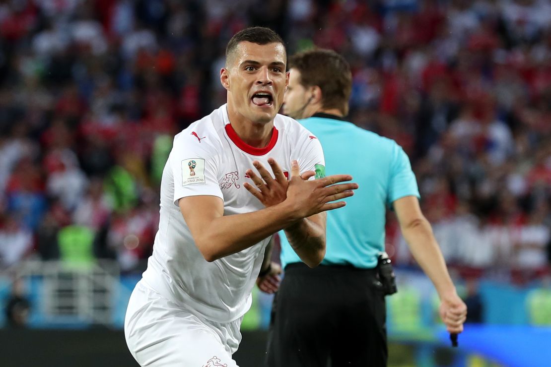 Granit Xhaka celebrates Switzerland's equaliser in the 2-1 win over Serbia.