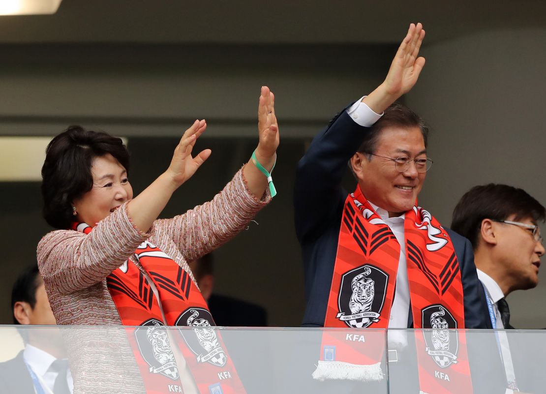 South Korean President Moon Jae-in watches from the stands as his side fall to defeat