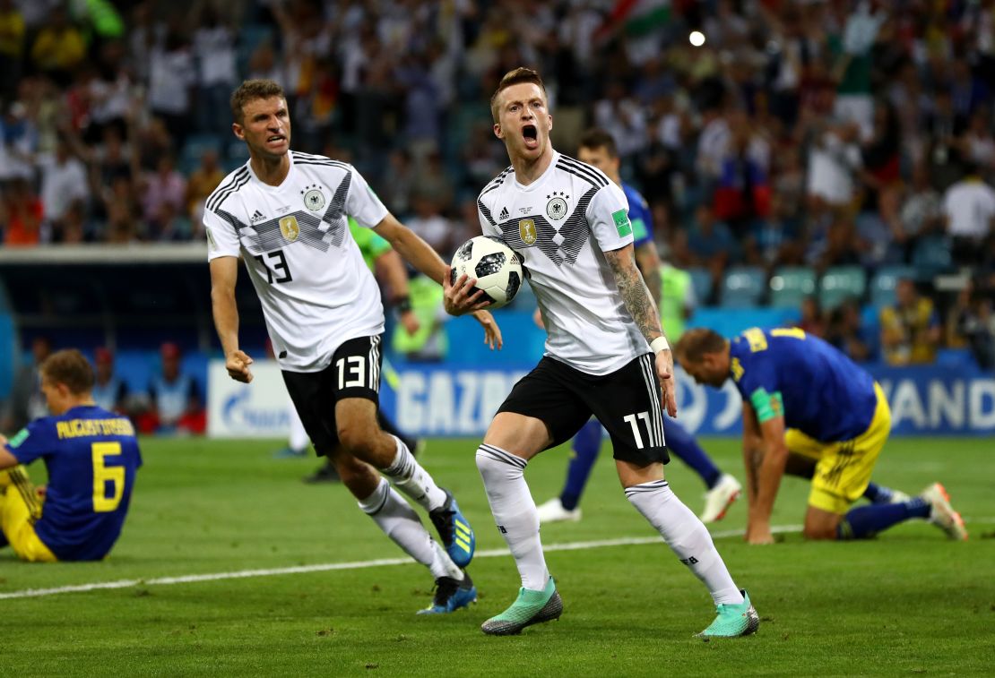 Marco Reus celebrates after bringing Germany level in the opening minutes of the second half.