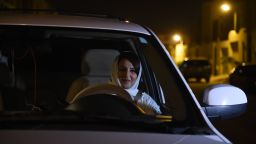Saudi Samar Almogren prepares to drive her car through Riyadh city's streets for the first time just after midnight, June 24, 2018, when the law allowing women to drive took effect.