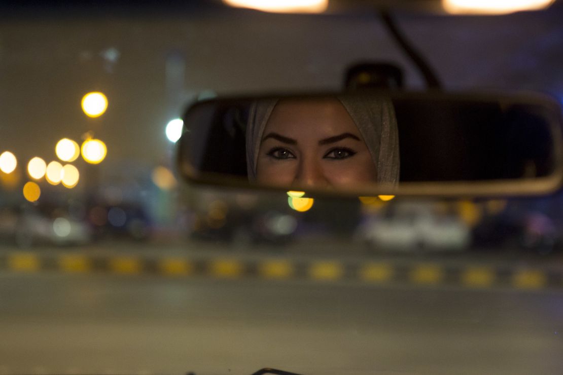 Walaa Abou Najem, 30, drives her car for the first time through the streets of Riyadh early Sunday.