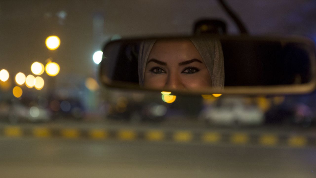 Walaa Abou Najem, 30, drives her car for the first time through the streets of Riyadh early Sunday.