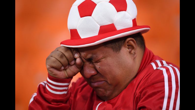 A Peru fan looks dejected after Peru's 1-0 loss to France on Thursday, June 21.