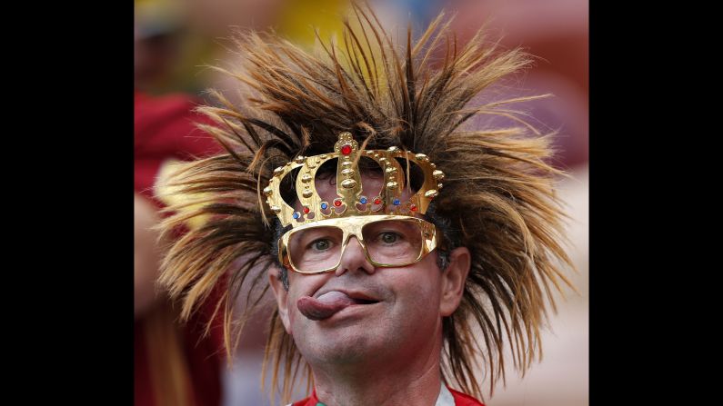 A Portugal fan sticks his tongue out before the match between Portugal and Morocco on Wednesday, June 20. 