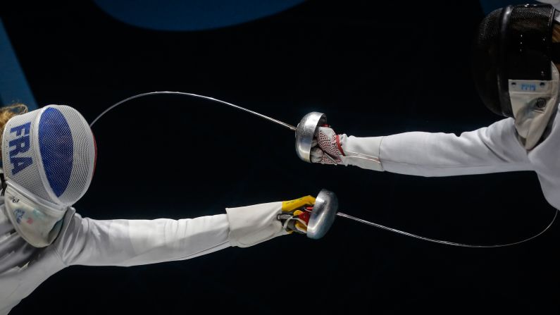 France's Mallo Auriane, left, challenges Zamachowska Aleksandra from Poland during the women's final of Epee competition at the European Fencing Championships in Novi Sad, on Thursday, June 21.