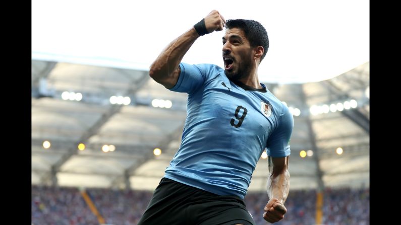 Luis Suarez celebrates after scoring for Uruguay on Wednesday, June 20. It was the only goal of the match against Saudi Arabia, and the final result means Uruguay advances to the tournament's knockout stage. 