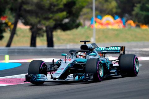 Briton Lewis Hamilton won the first French Grand Prix since 2008.<br />The Mercedes driver avoided the worst of a dramatic start that saw title rival Sebastian Vettel clip Valtteri Bottas. Both drivers sustained damage in the collision, forcing them to pit early them and fall to the back of the grid.