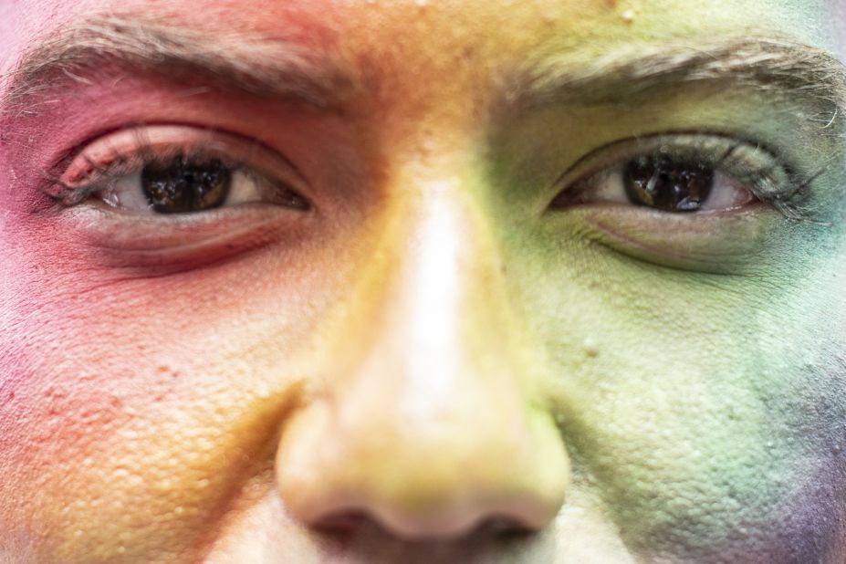A person with a rainbow-painted face takes part in the annual Gay Pride Parade in Mexico City on Saturday, June 23.
