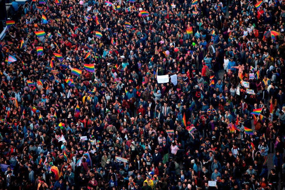 People take part in the Gay Pride Parade in Santiago, Chile, on Saturday.