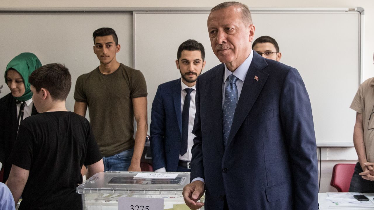 President Recep Tayyip Erdogan casts his vote in Istanbul on Sunday.