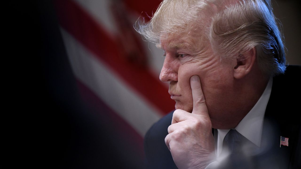 TOPSHOT - US President Donald Trump makes remarks to the media before a cabinet meeting in the Cabinet Room of the White House, in Washington, DC, on June 21, 2018. (Photo by Olivier Douliery / AFP)        (Photo credit should read OLIVIER DOULIERY/AFP/Getty Images)