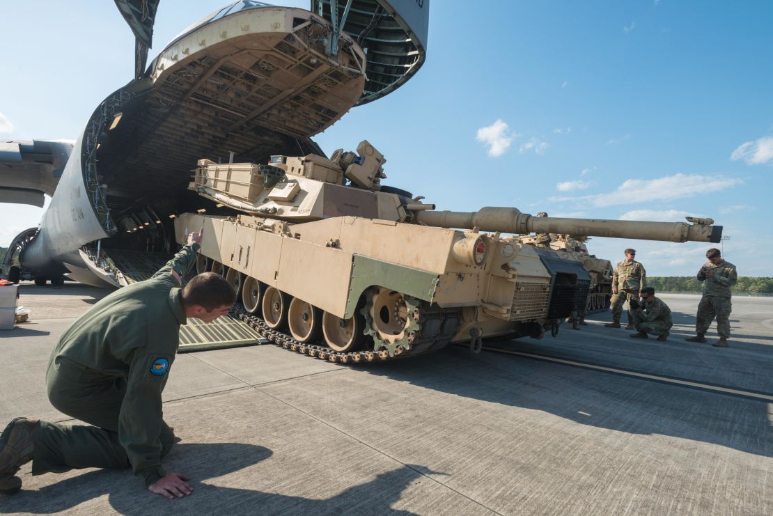 Soldiers of the 2nd Battalion, 7th Infantry Regiment, 1st Armored Brigade Combat Team, 3rd Infantry Division load a M1A1 Abrams tank onto a C5 "Super Galaxy" at Hunter Army Airfield, Ga, March 28, 2017. 