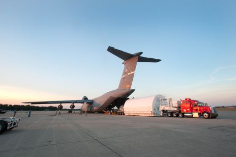 A C-5 also transported a Webb telescope backplane Pathfinder -- or practice model -- and unloaded it at Joint Base Andrews in Maryland.
