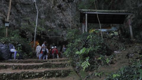 Rescue teams gather at the entrance of a deep cave where a group of boys went missing in Chiang Rai, northern Thailand.