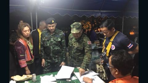 Officials search for a group of 13 trapped in a Thai cave.