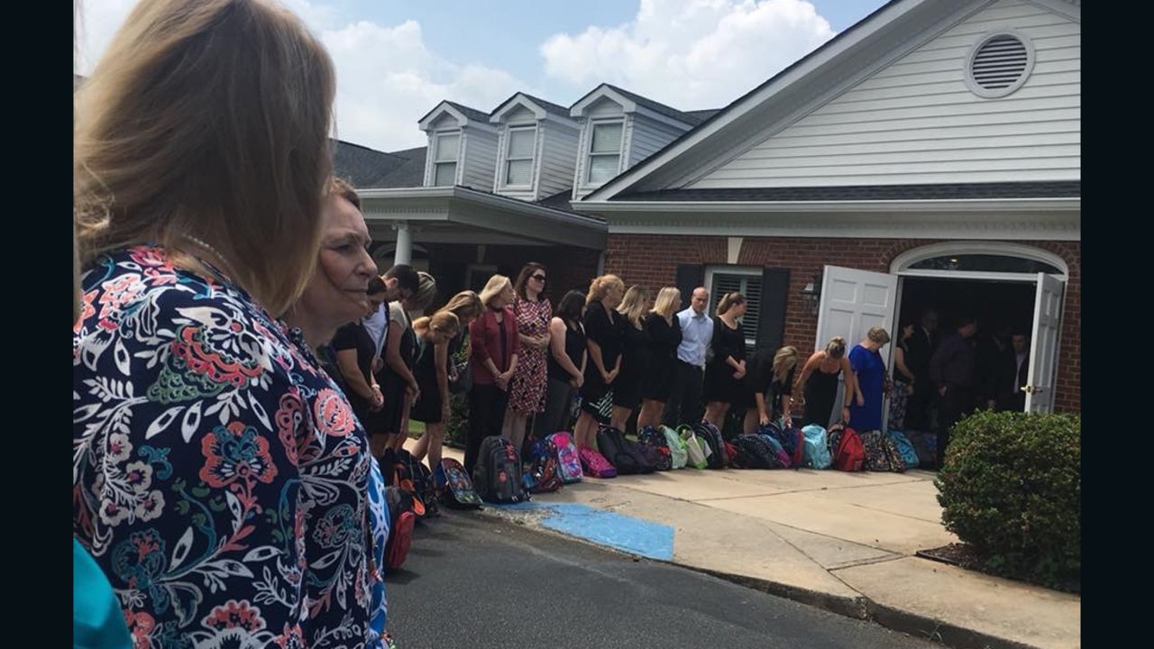 About 100 teachers were named honorary pallbearers at Waddell's funeral.