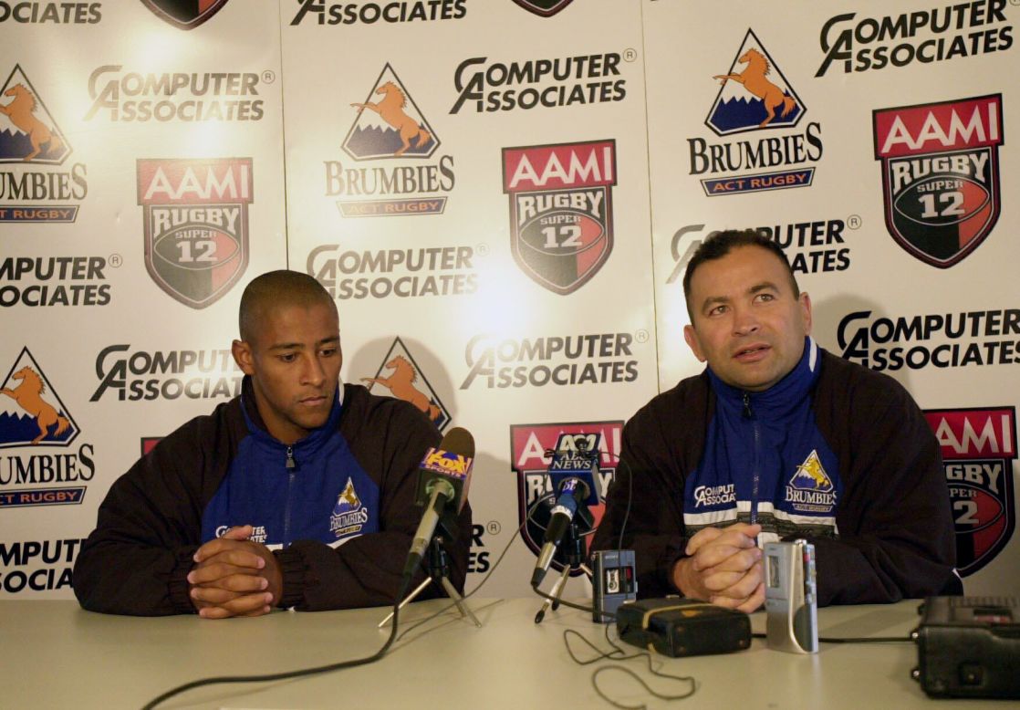The former schoolteacher began his top-flight coaching career with Australia's ACT Brumbies after a spell as a coach in Japan. Jones is pictured here with Brumbies captain George Gregan (left).