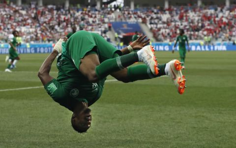Salem Al-Dawsari celebrates with a flip after scoring the match-winning goal against Egypt.