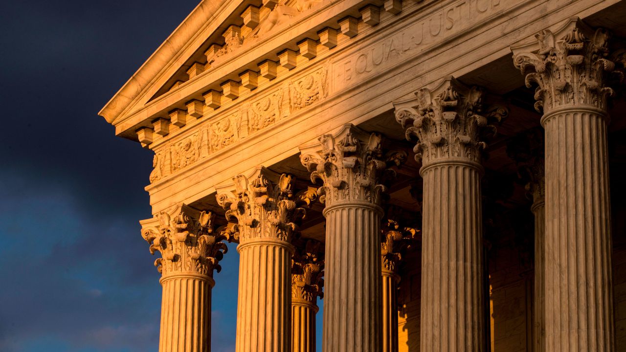 FILE - In this Oct. 10, 2017, file photo, the Supreme Court in Washington is seen at sunset. The Supreme Court is ordering Washington courts to take a new look at the case of a florist who refused to provide services for the wedding of two men because of her religious objection to same-sex marriage.  The justices' order Monday means the court is passing for now on the chance to decide whether business owners can refuse on religious grounds to comply with anti-discrimination laws that protect LGBT people.(AP Photo/J. Scott Applewhite, File)