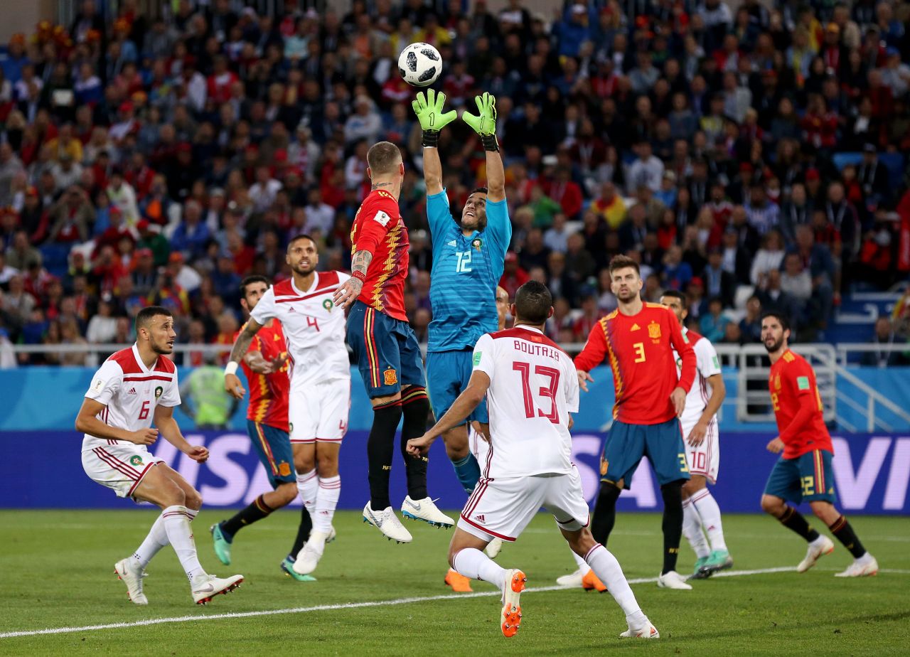 Moroccan goalkeeper Munir catches the ball against Spain. That match ended 2-2, with Spain winning the group.
