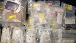 Bags of heroin and fentanyl are displayed before a press conference regarding a major drug bust in New York City in 2016. 