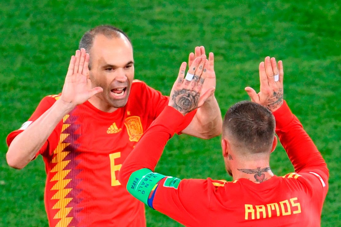 Andres Iniesta (left) created Spain's first goal.