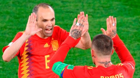 Andres Iniesta (left) created Spain's first goal.