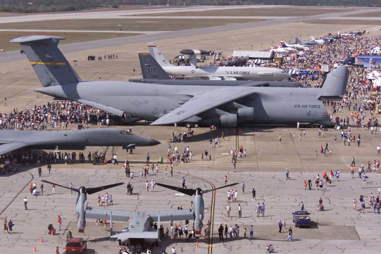 The largest airplane in the US military, the Air Force C-5 Galaxy dwarfs all other aircraft in this 2004 photo from Florida's Eglin Air Force Base. Click through the gallery for examples of the huge military equipment this monster airplane can haul. 