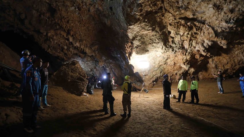 Rescue teams gather in a deep cave where a group of boys went missing in Chang Rai, northern Thailand, Monday, June 25, 2018. Officials say multiple attempts to locate the 12 boys and their soccer coach missing in a flooded cave in northern Thailand for nearly two days have failed, but that they will keep trying. (Krit Promsakla Na Sakolnakorn/Thai News Pix via AP)