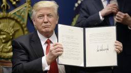 ARLINGTON, VA - JANUARY 27: U.S. President Donald Trump signs executive orders in the Hall of Heroes at the Department of Defense on January 27, 2017 in Arlington, Virginia. Trump signed two orders calling for the "great rebuilding" of the nation's military and the "extreme vetting" of visa seekers from terror-plagued countries. (Photo by Olivier Douliery/Pool/Getty Images)