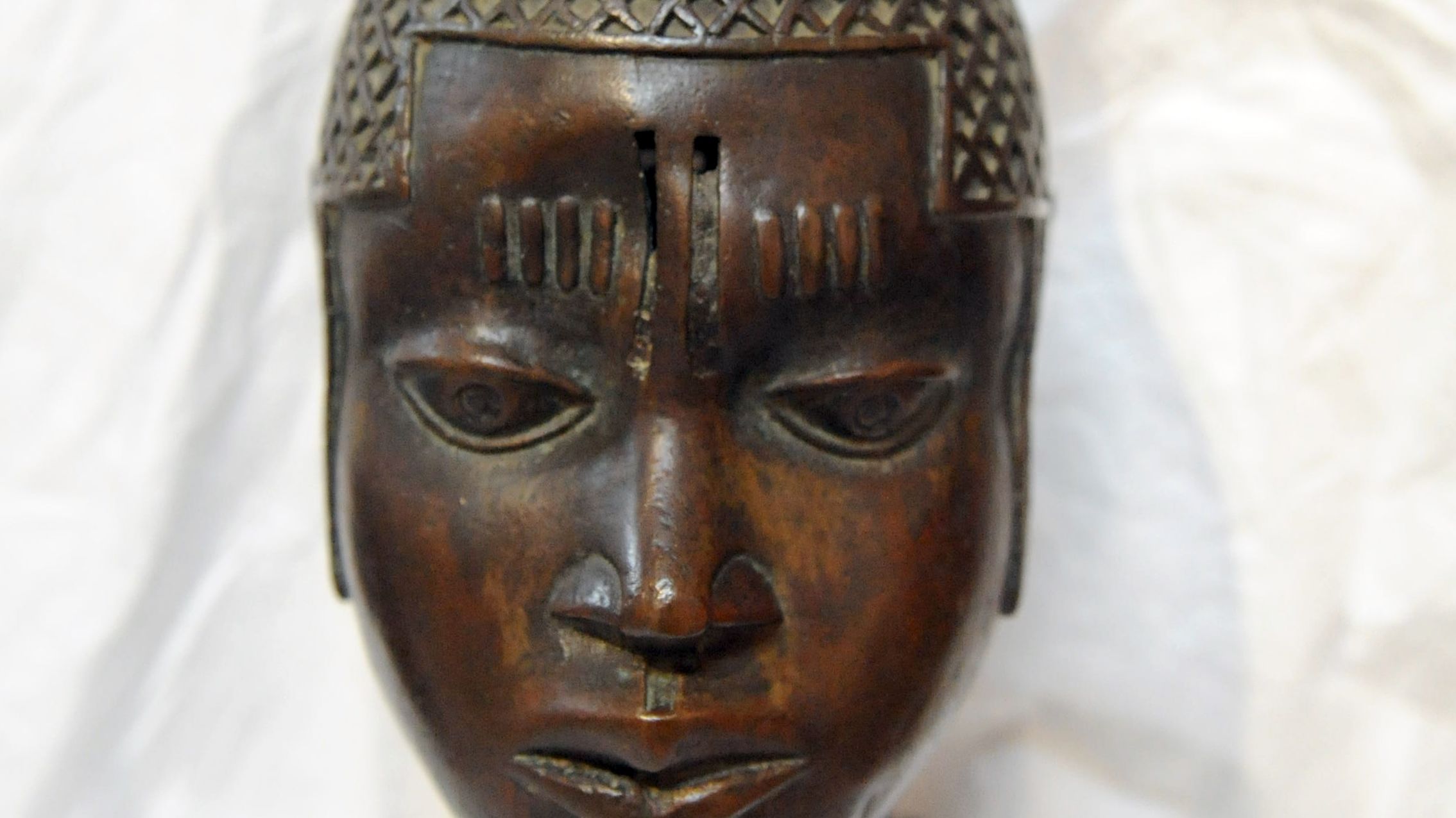 Sixteenth-Century Head of a Queen mother of Benin loan to the Royal Academy of Arts in London by the National Commission for Museums and Monuments returned to Nigeria on January 16, 2013.