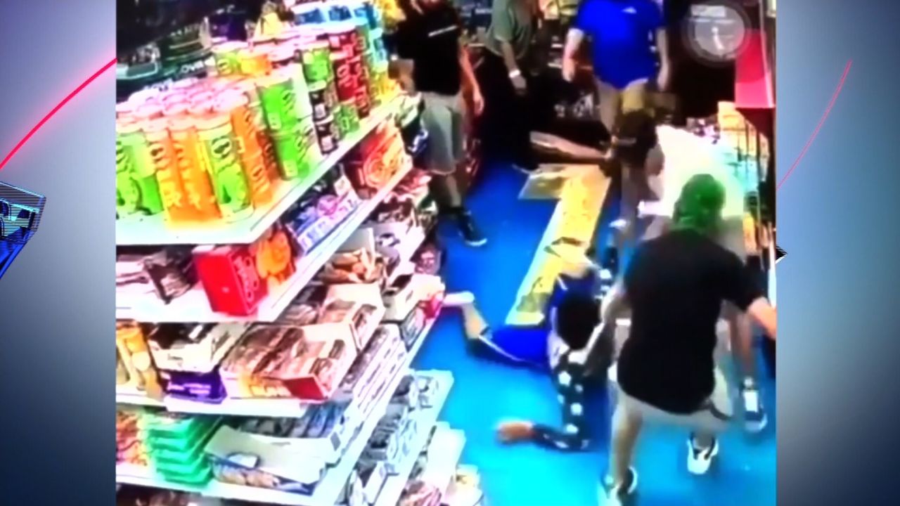 Surveillance video shows the teenager being dragged out of a Bronx bodega by a group of men.