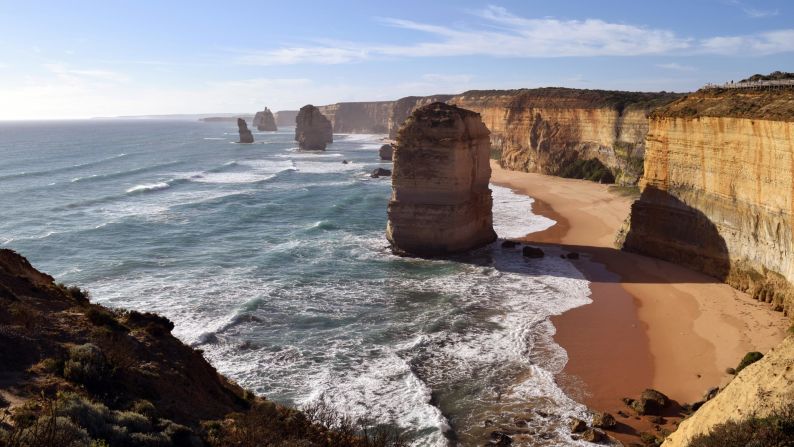 <strong>November in Melbourne, Australia:</strong> Waves crash into the base of limestone structures known as the Twelve Apostles. Head west from Melbourne, and you can see these wonders of nature at the Port Campbell National Park by the Great Ocean Road.
