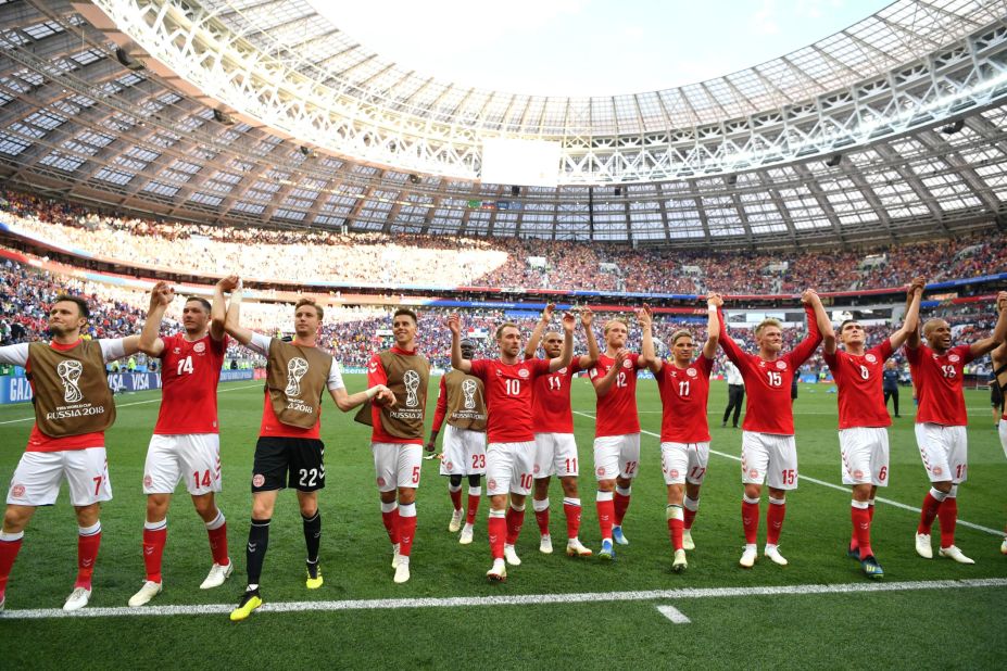 Danish players acknowledge fans after their scoreless draw with France on June 26. Both teams advanced to the knockout stage.
