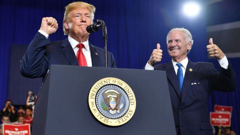 South Carolina Governor Henry McMaster (R) gives two thumbs up as US President Donald Trump speaks during a rally at Airport High School in West Columbia, South Carolina, on June 25, 2018. (Photo by MANDEL NGAN / AFP)        (Photo credit should read MANDEL NGAN/AFP/Getty Images)