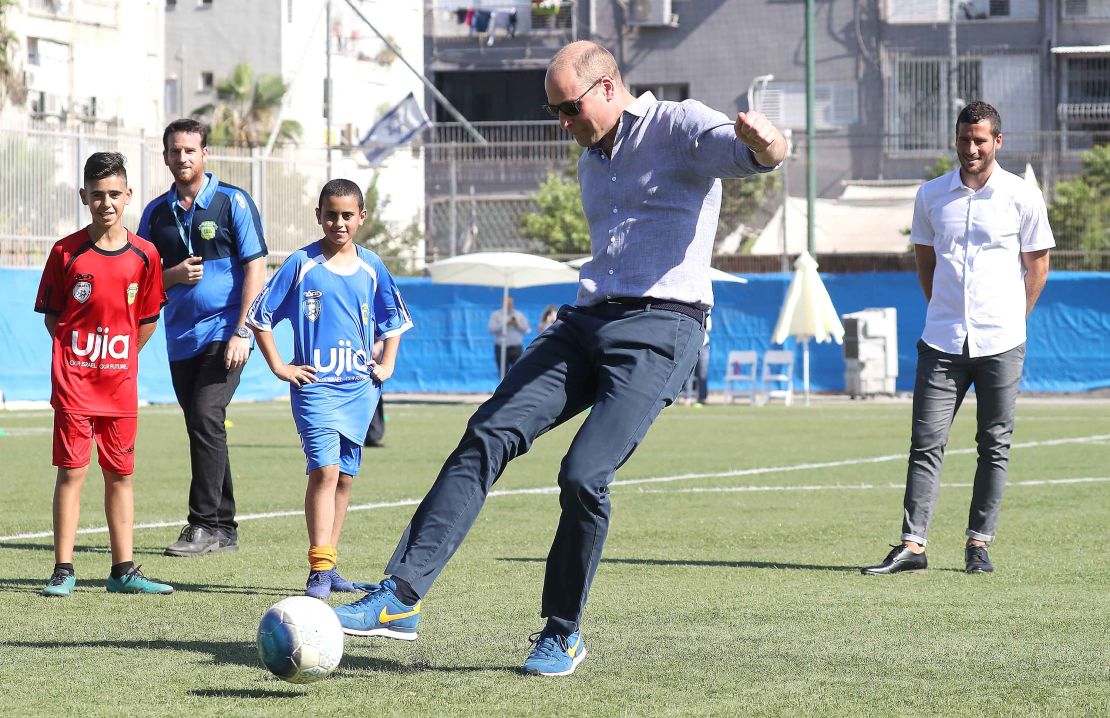 The Duke of Cambridge takes a penalty kick as he visits a football-based youth programme on Tuesday. 