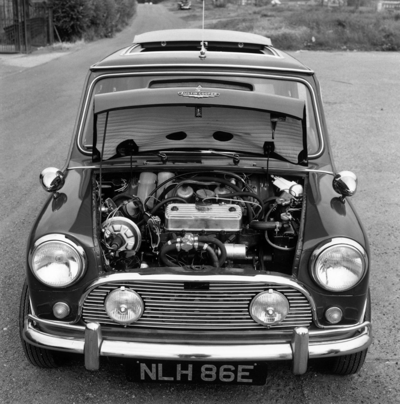 This Austin Mini Cooper S was pictured in 1967 with its bonnet raised to show the engine. The classic car, made famous by the Michael Caine film "The Italian Job," will be relaunched in 2019 as a fully electric vehicle. 