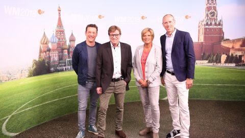 Oliver Schmidt, Bela Rethy, Claudia Neumann and Martin Schneider pose for a picture during the ARD and ZDF FIFA World Cup presenter team presentation.