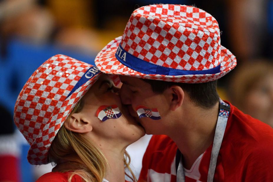 Croatia supporters kiss ahead of the match against Iceland.