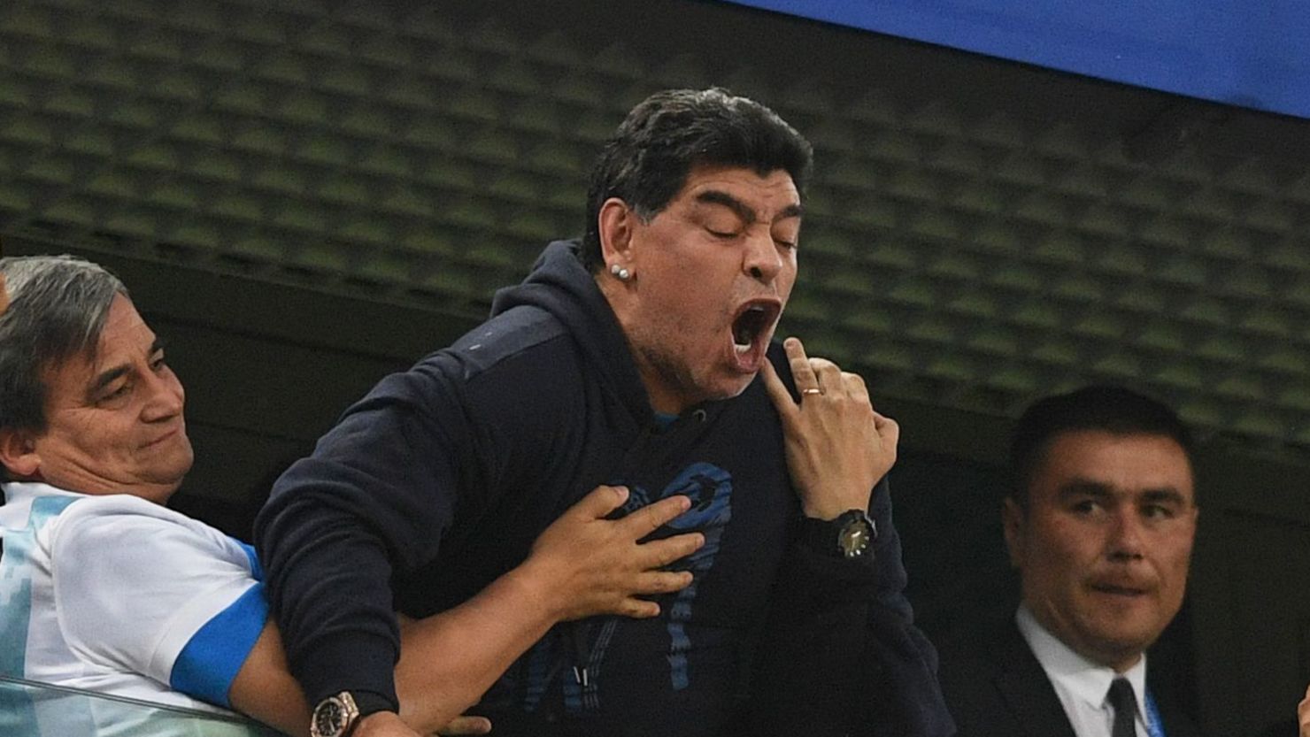 Retired Argentina player Diego Maradona (C) gestures during the Russia 2018 World Cup Group D football match between Nigeria and Argentina.