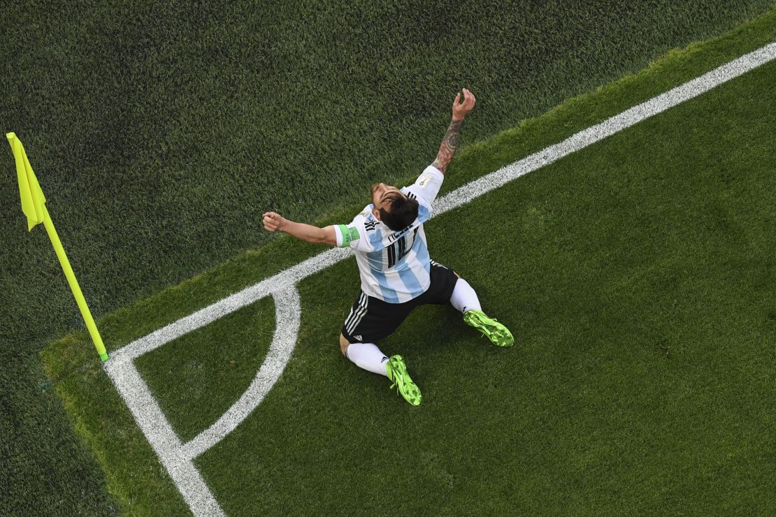 Messi celebrates scoring in the first half.