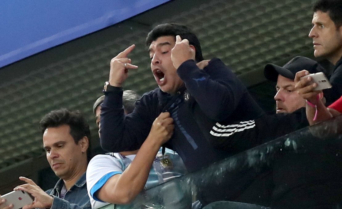 Argentina's fans celebrated Rojo's winner ecstatically, notably football legend Diego Maradona who directed a middle-finger salute -- with both hands -- at hecklers below where he was sitting.
