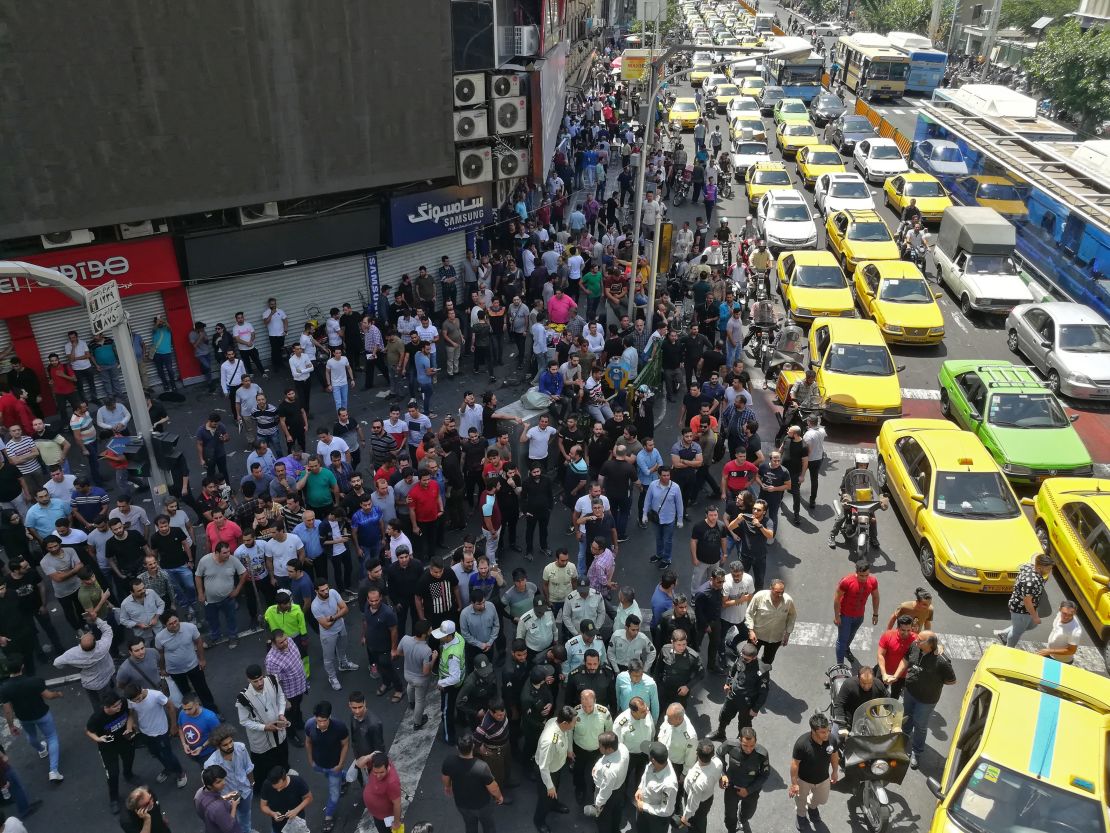 Iranian protesters gather during a demonstration in central Tehran on June 25, 2018.