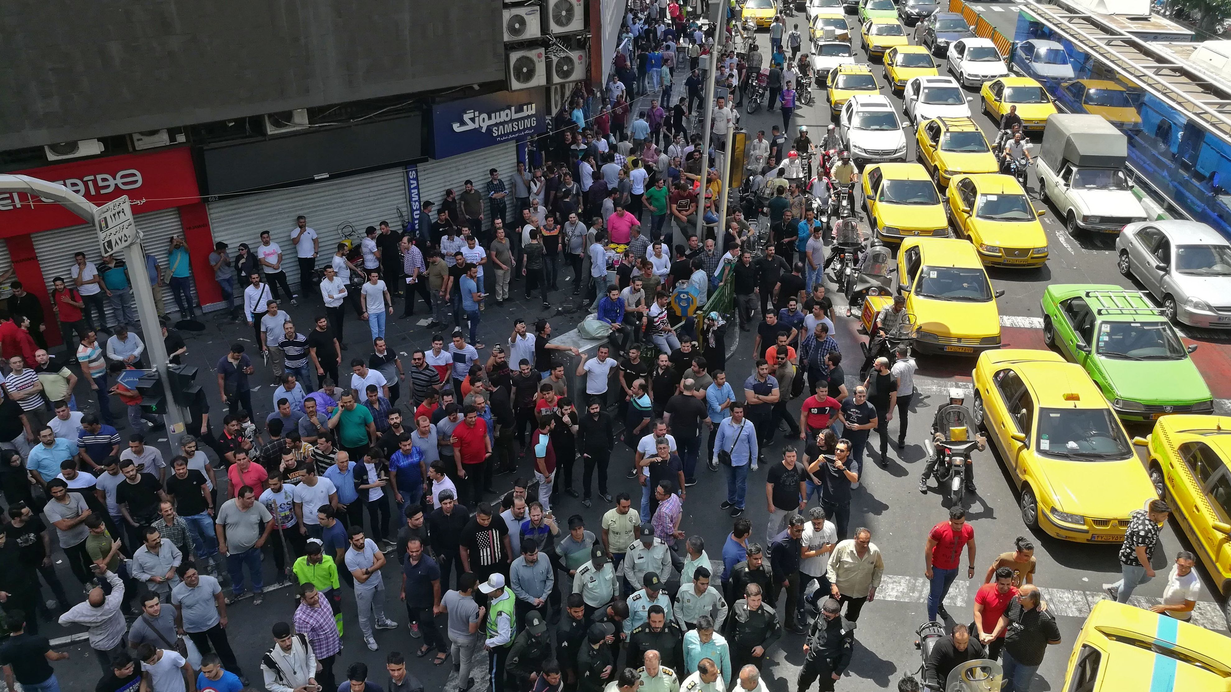 Iranian protesters gather during a demonstration in central Tehran on June 25, 2018.