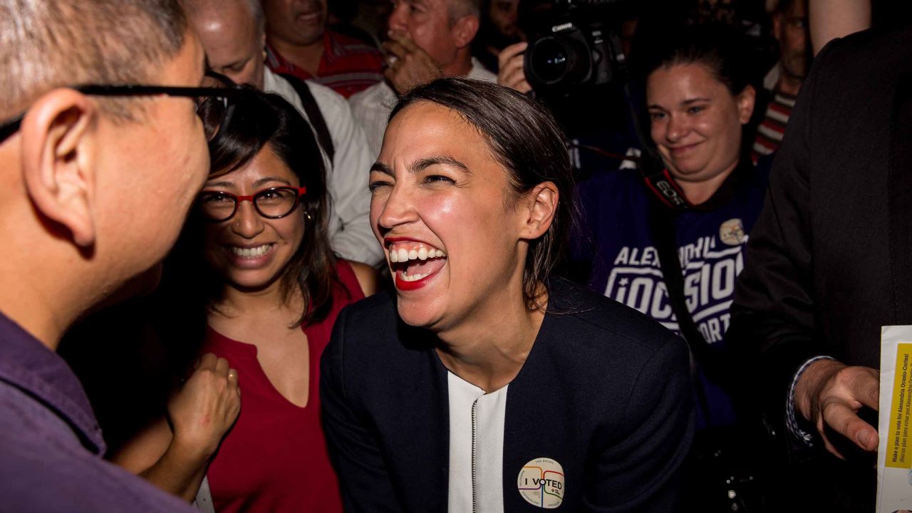 NEW YORK, NY - JUNE 26: Progressive challenger Alexandria Ocasio-Cortez celebrartes with supporters at a victory party in the Bronx after upsetting incumbent Democratic Representative Joseph Crowly on June 26, 2018 in New York City. Ocasio-Cortez upset Rep. Joseph Crowley in New York's 14th Congressional District, which includes parts of the Bronx and Queens. (Photo by Scott Heins/Getty Images)