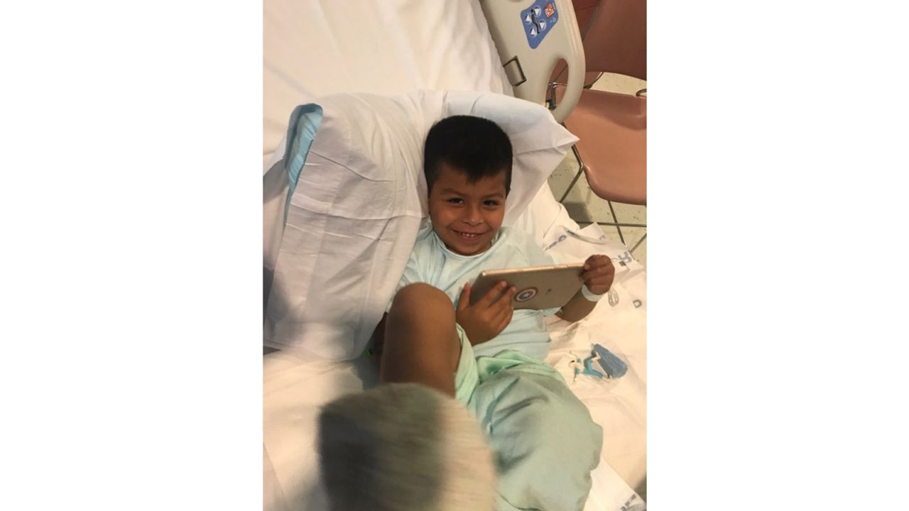 5-year-old Vincent recovers in the hospital after being saved by Mozqueda. 