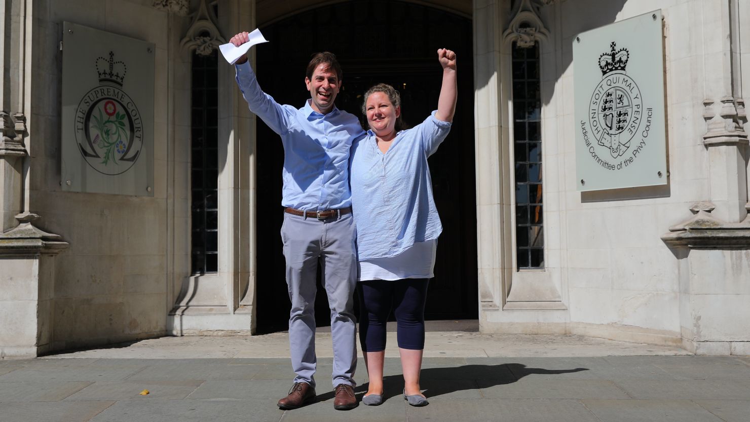 Charles Keidan and Rebecca Steinfeld celebrate after the ruling.